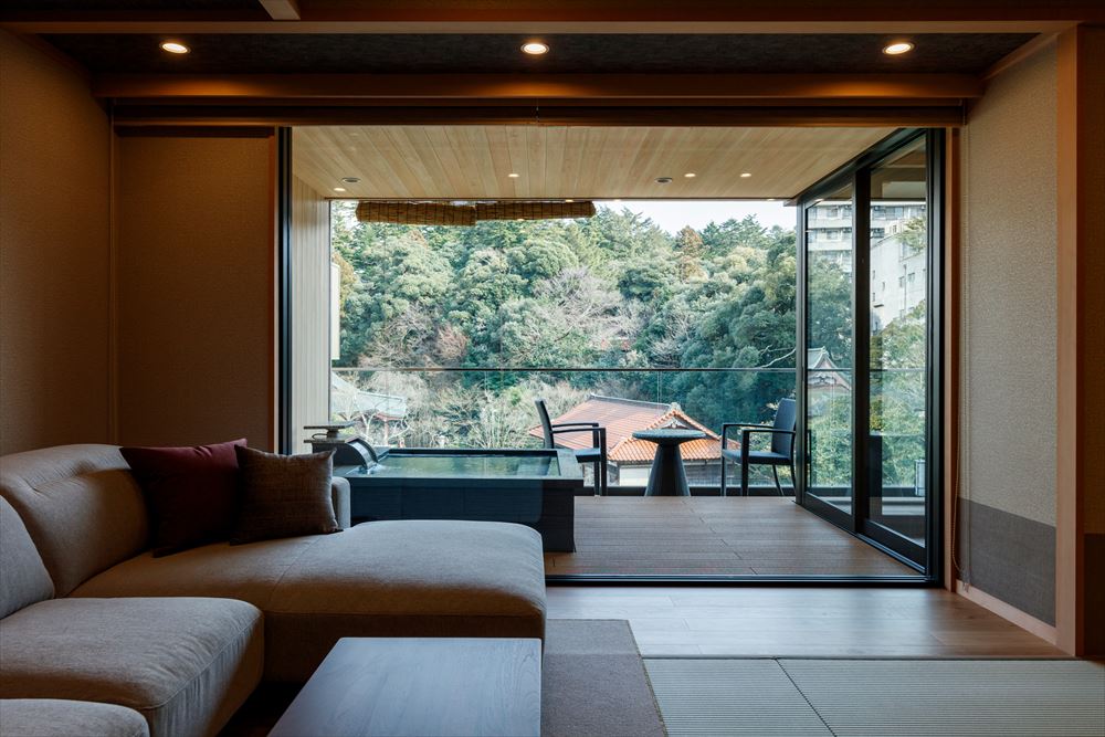 Tachibana Shikitei. Japanese Jr. Suite with open-air bath: this guest room with an open-air bath was opened in March 2023, with twin beds and a sofa in a 15 tatami-mat Japanese-style room.